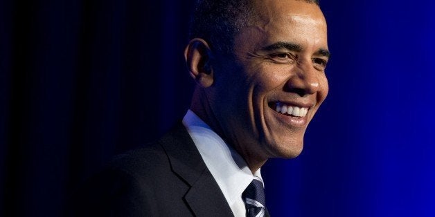 US President Barack Obama speaks about the healthcare reform laws, known as Obamacare, at an Organizing for Action event in Washington, DC, November 4, 2013. AFP PHOTO / Saul LOEB (Photo credit should read SAUL LOEB/AFP/Getty Images)