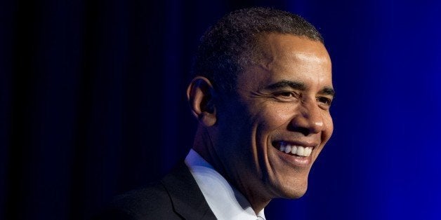 US President Barack Obama speaks about the healthcare reform laws, known as Obamacare, at an Organizing for Action event in Washington, DC, November 4, 2013. AFP PHOTO / Saul LOEB (Photo credit should read SAUL LOEB/AFP/Getty Images)