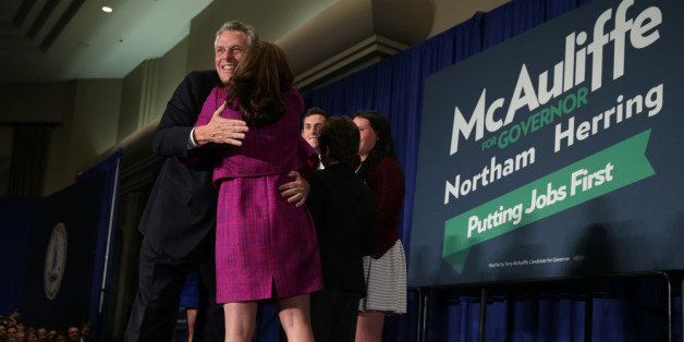 TYSONS CORNER, VA - NOVEMBER 05: Democrat Terry McAuliffe hugs his wife Dorothy after winning the Virginia governorship at an election-night party November 5, 2013 at Sheraton Premiere Hotel in Tysons Corner, Virginia. McAuliffe defeated Republican state Attorney General Ken Cuccinelli. (Photo by Alex Wong/Getty Images)