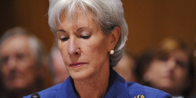 US Health and Human Services Secretary Kathleen Sebelius pauses as she testifies before the Senate Finance Committee on health insurance exchanges on November 6, 2013 in the Dirksen Senate Office on Capitol Hill in Washington, DC. AFP PHOTO/Mandel NGAN (Photo credit should read MANDEL NGAN/AFP/Getty Images)