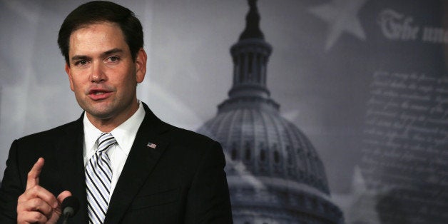 WASHINGTON, DC - OCTOBER 30: U.S. Sen. Marco Rubio (R-FL) speaks to members of the media during a press conference October 30, 2013 on Capitol Hill in Washington, DC. Sen. Rubio joined Sen. Ron Johnson (R-WI) and Rep. Ron DeSantis (R-FL) at a news conference to introduce their joint legislation, the If You Like Your Health Care Plan You Can Keep It Act. (Photo by Alex Wong/Getty Images)