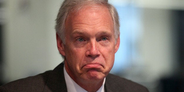 Senator Ron Johnson, a Republican from Wisconsin, pauses during an interview in Washington D.C., U.S., on Friday, Oct. 11, 2013. Johnson said at a Bloomberg breakfast today that lawmakers were using the debt ceiling for leverage because 'how else can you get those people -- the president, Democrats in the Senate and the House -- to come to the table and start working with you in good faith to solve a long-term problem?' Photographer: Julia Schmalz/Bloomberg via Getty Images