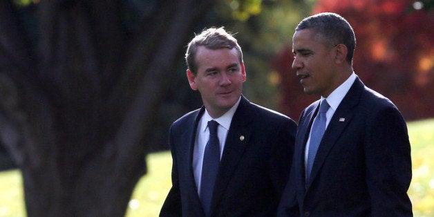 WASHINGTON, DC - NOVEMBER 06: U.S. President Barack Obama (R) walks with Sen. Michael Bennet (D-CO) toward Marine One to depa