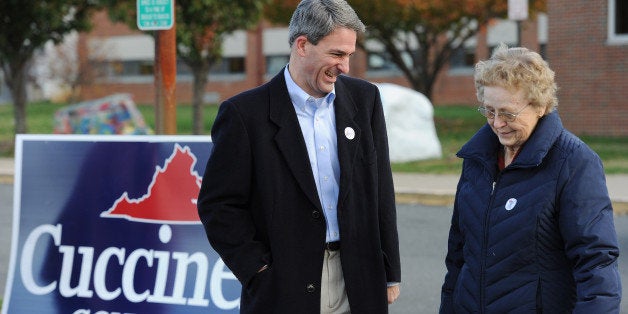 NOKESVILLE, VA- NOVEMBER 05: Virginia gubernatorial candidate Ken Cuccinelli, center, talks with Mary Weybright outside Brentsville District High School on election day on Tuesday November 05, 2013 in Nokesville, VA. (Photo by Matt McClain/ The Washington Post via Getty Images)