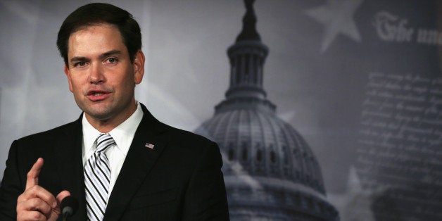 WASHINGTON, DC - OCTOBER 30: U.S. Sen. Marco Rubio (R-FL) speaks to members of the media during a press conference October 30, 2013 on Capitol Hill in Washington, DC. Sen. Rubio joined Sen. Ron Johnson (R-WI) and Rep. Ron DeSantis (R-FL) at a news conference to introduce their joint legislation, the If You Like Your Health Care Plan You Can Keep It Act. (Photo by Alex Wong/Getty Images)