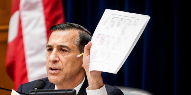 Representative Darrell Issa, a Republican from California, refers to a document while he chairs a House Oversight and Government Reform Committee hearing in Washington, D.C., U.S., on Wednesday, Nov. 13, 2013. Republican lawmakers criticized potential security flaws in the U.S. health exchanges as Obama administration officials said they have made protecting customer privacy a top priority in their efforts to fix the website. Photographer: Pete Marovich/Bloomberg via Getty Images 