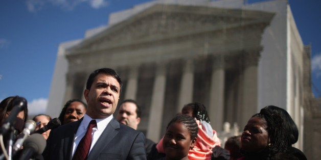 WASHINGTON, DC - FEBRUARY 27: NAACP Legal Defense and Educational Fund Special Council Debo Adegbile talks to reporters outside of the U.S. Supreme Court February 27, 2013 in Washington, DC. Adegbile argued before the court in Shelby County v. Holder, a legal challenge to Section 5 of the Voting Rights Act. (Photo by Chip Somodevilla/Getty Images)