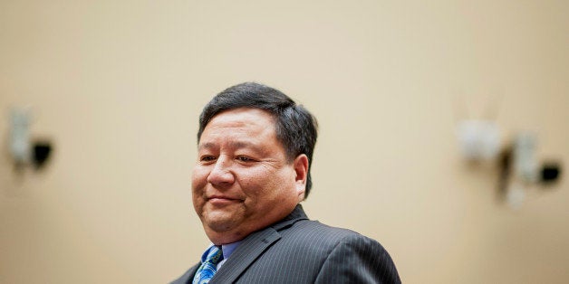 Henry Chao, deputy chief information officer for the Centers for Medicare and Medicaid Services, prepares to testify during a House Oversight and Government Reform Committee hearing on Capitol Hill in Washington, D.C., U.S., on Wednesday, Nov. 13, 2013. Republican lawmakers criticized potential security flaws in the U.S. health exchanges as Obama administration officials said they have made protecting customer privacy a top priority in their efforts to fix the website. Photographer: Pete Marovich/Bloomberg via Getty Images 