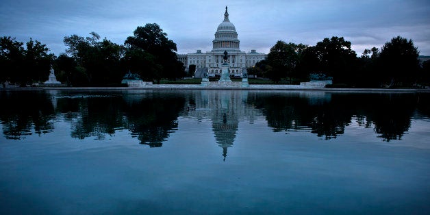 A view of Capitol Hill October 16, 2013 in Washington, DC. US senators scrambled together an eleventh hour compromise Wednesday that they hoped might protect Washington's battered financial standing by heading off fears of a default. The Senate deal must still pass a divided and unpredictable House of Representatives, but lawmakers were hopeful it will allow the US government to reopen and keep borrowing to meet its obligations. AFP PHOTO/Brendan SMIALOWSKI (Photo credit should read BRENDAN SMIALOWSKI/AFP/Getty Images)