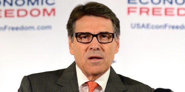 Texas Governor Rick Perry responds to questions during a press conference on the sidelines of the Republican Party's State Party Convention in Anaheim, California, on October 4, 2013. More than 1,000 party activists and leaders are expected to attend the three-day convention. AFP PHOTO/Frederic J. BROWN (Photo credit should read FREDERIC J. BROWN/AFP/Getty Images)