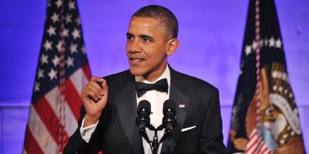 US President Barack Obama addresses a dinner honoring Medal of Freedom recipients on November 20, 2013 at the Smithsonian Nat