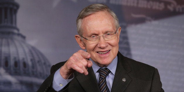 WASHINGTON, DC - NOVEMBER 21: Senate Majority Leader Harry Reid (D-NV) talks to reporters about the use of the 'nuclear option' at the U.S. Capitol November 21, 2013 in Washington, DC. The Senate voted 52-48 to invoke the so-called 'nuclear option', voting to change Senate rules on the controversial filibuster for most presidential nominations with a simple majority vote. (Photo by Chip Somodevilla/Getty Images)