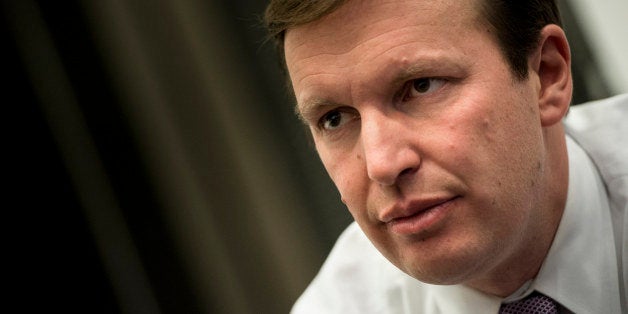 US Senator Chris Murphy, Democrat of Connecticut, sits during an interview in his office on Capitol Hill November 21, 2013 in