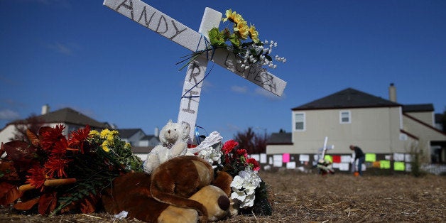 SANTA ROSA, CA - OCTOBER 29: Flowers and stuffed toys sit at a memorial for 13 year-old Andy Lopez who was shot by a Sonoma County sheriff deputy last week on October 29, 2013 in Santa Rosa, California. 13 year-old Andy Lopez was shot and killed by a Sonoma County sheriff deputy as he carried a toy replica of an AK-47 assualt rifle one week ago. (Photo by Justin Sullivan/Getty Images)