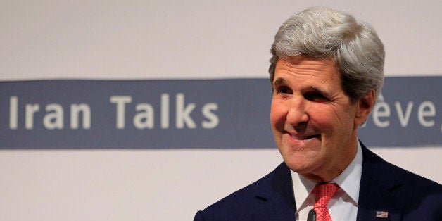 US Secretary of State John Kerry delivers a speech during a press conference at the CICG (Centre International de Conferences Geneve) after talks over Iran's nuclear programme in Geneva on November 24, 2013. World powers on November 24 agreed a landmark deal with Iran halting parts of its nuclear programme in what US President Barack Obama called 'an important first step'. According to details of the accord agreed in Geneva provided by the White House, Iran has committed to halt uranium enrichment above purities of five percent. AFP PHOTO / ALEXANDER KLEIN (Photo credit should read ALEXANDER KLEIN/AFP/Getty Images)