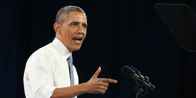 SAN FRANCISCO, CA - NOVEMBER 25: U.S. President Barack Obama speaks at the Betty Ann Ong Chinese Recreation Center on November 25, 2013 in San Francisco, California. President Obama delivered a speech on immigration reform and will attend fundraisers in the San Francisco Bay Area. (Photo by Justin Sullivan/Getty Images)