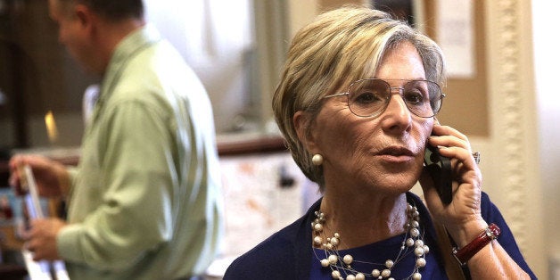 WASHINGTON, DC - JUNE 12: U.S. Sen. Barbara Boxer (D-CA) talks on her cellular phone prior to a news conference June 12, 2013 on Capitol Hill in Washington, DC. Boxer and McDermott held a news conference to announce that they are introducing a bill to block congressional pay if lawmakers fail to raise the debt ceiling. (Photo by Alex Wong/Getty Images)