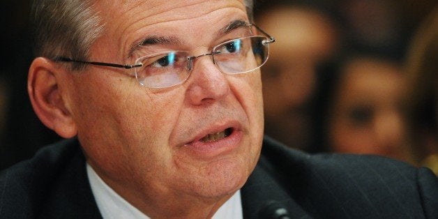 US Senator Robert Menendez, D-NJ, speaks as he introduces Defense Department general counsel Jeh Johnson to the Senate Homeland Security and Governmental Affairs Committee for Johnson's nomination to be Homeland Security secretary in the Dirksen Senate Office Building on November 13, 2013 in Washington, DC. AFP PHOTO/Mandel NGAN (Photo credit should read MANDEL NGAN/AFP/Getty Images)