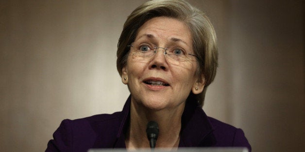 WASHINGTON, DC - NOVEMBER 14: U.S. Sen. Elizabeth Warren (D-MA) speaks during a confirmation hearing for Nominee for the Federal Reserve Board Chairman Janet Yellen before Senate Banking, Housing and Urban Affairs Committee November 14, 2013 on Capitol Hill in Washington, DC. Yellen will be the first woman to head the Federal Reserve if confirmed by the Senate and will succeed Ben Bernanke. (Photo by Alex Wong/Getty Images)