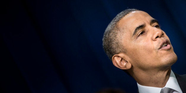US President Barack Obama speaks during an event on the grounds of the White House December 3, 2013 in Washington, DC. Obama