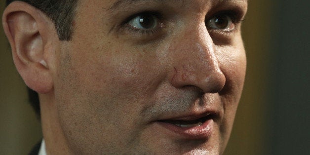 WASHINGTON, DC - NOVEMBER 06: U.S. Sen. Ted Cruz (R-TX) talks to a reporter after a news conference on military sexual assault November 6, 2013 on Capitol Hill in Washington, DC. A bipartisan group of senators are pushing to create an independent military justice system with the 2014 National Defense Authorization Act (NDAA). (Photo by Alex Wong/Getty Images)