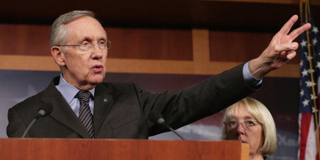 WASHINGTON, DC - NOVEMBER 21: Senate Majority Leader Harry Reid (D-NV) talks to reporters about the use of the 'nuclear option' with Senate Budget Committee Chair Patty Murray (D-WA) at the U.S. Capitol November 21, 2013 in Washington, DC. The Senate voted 52-48 to invoke the so-called 'nuclear option', voting to change Senate rules on the controversial filibuster for most presidential nominations with a simple majority vote. (Photo by Chip Somodevilla/Getty Images)