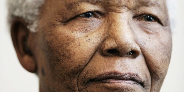 TROMSO, NORWAY - JUNE 11: Nelson Mandela attends a photocall ahead of tonight's '46664 Arctic' concert, at the Rica Hotel on