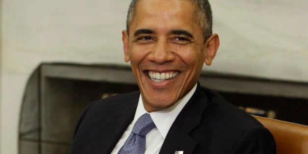 U.S. President Barack Obama smiles during a meeting with Benjamin Netanyahu, prime minister of Israel, not seen, at the White