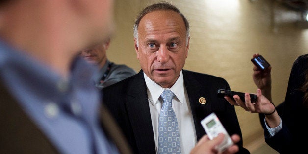 UNITED STATES - OCTOBER 4: Rep. Steve King, R-Iowa, speaks with reporters as he leaves the House Republican Conference meeting in the basement of the Capitol on Friday, Oct. 4, 2013. (Photo By Bill Clark/CQ Roll Call)