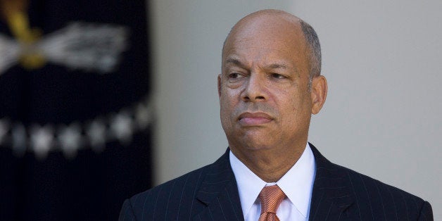 Jeh Johnson, former Pentagon general counsel and U.S. President Barack Obama's nominee as secretary of Homeland Security, listens as Obama, not pictured, speaks during a nomination announcement in the Rose Garden of the White House in Washington, D.C., U.S., on Friday, Oct. 18, 2013. Johnson, one of the president's earliest supporters, was a fundraiser and senior foreign policy adviser on Obama's 2008 presidential campaign. Photographer: Andrew Harrer/Bloomberg via Getty Images 