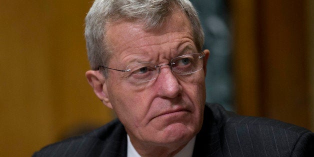 Senator Max Baucus, a Democrat from Montana and chairman of the Senate Finance Committee, listens during a hearing with Kathleen Sebelius, secretary of Health and Human Services (HHS), not pictured, in Washington, D.C., U.S., on Wednesday, Nov. 6, 2013. Baucus, the lead architect of Obamacare in the Senate said the U.S. health secretary needs to stay at the helm to repair the insurance exchanges and must 'meet, and I'd prefer you beat' an end-of-the-month deadline for the fixes. Photographer: Andrew Harrer/Bloomberg via Getty Images 