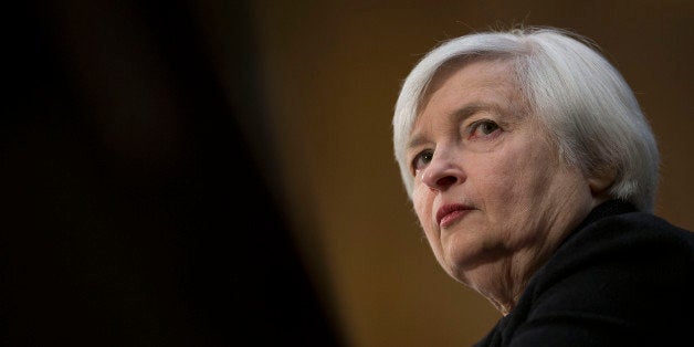 Janet Yellen, vice chairman of the U.S. Federal Reserve and U.S. President Barack Obama's nominee as chairman of the Federal Reserve, listens during a Senate Banking Committee confirmation hearing in Washington, D.C., U.S., on Thursday, Nov. 14, 2013. Yellen said she is committed to promoting a strong economic recovery and will ensure monetary stimulus isn't removed too soon. Photographer: Andrew Harrer/Bloomberg via Getty Images 