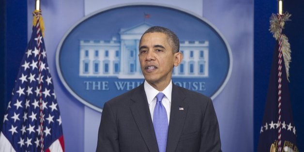 US President Barack Obama holds a press conference in the Brady Press Briefing Room at the White House in Washington, DC, December 20, 2013. AFP PHOTO / Saul LOEB (Photo credit should read SAUL LOEB/AFP/Getty Images)