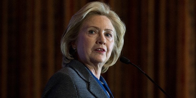 Former US Secretary of State Hillary Clinton speaks after receiving the 2013 Lantos Human Rights Prize during a ceremony on Capitol Hill in Washington on December 6, 2013. AFP PHOTO/Nicholas KAMM (Photo credit should read NICHOLAS KAMM/AFP/Getty Images)