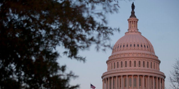 The U.S. Capitol stands at sunset in Washington, D.C., U.S., on Thursday, Dec. 12, 2013. A U.S. budget accord is on track to win passage in Congress largely because its most important accomplishment is pushing off automatic spending cuts that neither party likes. Photographer: Andrew Harrer/Bloomberg via Getty Images