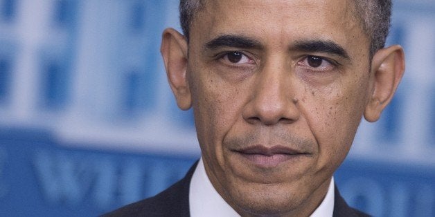 US President Barack Obama holds a press conference in the Brady Press Briefing Room at the White House in Washington, DC, December 20, 2013. AFP PHOTO / Saul LOEB (Photo credit should read SAUL LOEB/AFP/Getty Images)