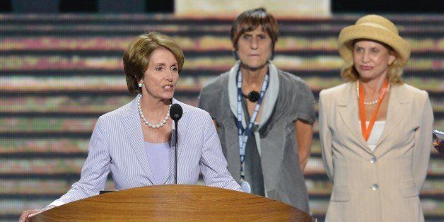 US Representatives Nancy Pelosi (L), Rosa DeLauro (C) and Carolyn Maloney (R) during a rehearsal in the Time Warner Cable Arena September 3, 2012 in Charlotte, North Carolina as preparations for the 2012 Democratic National Convention continue. AFP PHOTO / Stan HONDA (Photo credit should read STAN HONDA/AFP/GettyImages)