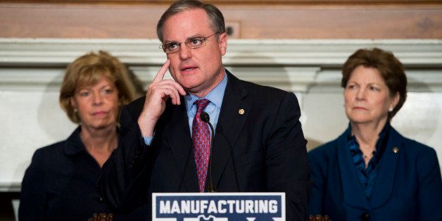 UNITED STATES - OCTOBER 29: Sen. Mark Pryor, D-Ark., flanked by Sens. Tammy Baldwin and Jeanne Shaheen, speaks during a news conference to launch a campaign to 'refocus Washington on manufacturing jobs.' on Tuesday, Oct. 29, 2013. (Photo By Bill Clark/CQ Roll Call)