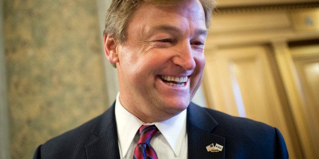 UNITED STATES - NOVEMBER 27: Sens. Dean Heller, R-Nev., talks with reporters before the senate luncheons in the Capitol. (Photo By Tom Williams/CQ Roll Call)