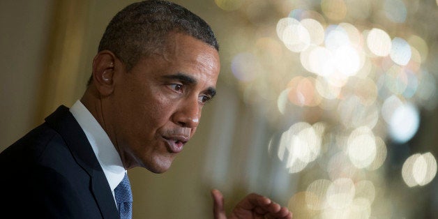 U.S. President Obama speaks in the East Room of the White House in Washington, D.C., U.S., on Tuesday, Jan. 7, 2014. Obama said extending emergency unemployment insurance will give a 'vital economic lifeline' to millions of people still grappling with the aftermath of the worst recession since the 1930s. Photographer: Andrew Harrer/Bloomberg via Getty Images 