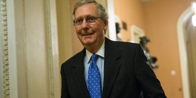 WASHINGTON, DC - OCTOBER 16: U.S. Senate Minority Leader Sen. Mitch McConnell (R-KY) walks to the Senate Chamber at the U.S. Capitol October 16, 2013 in Washington, DC. On the 16th day of a government shutdown, Senate Majority Leader Sen. Harry Reid (D-NV) and Minority Leader Sen. Mitch McConnell (R-KY) announced that they have reached to an agreement to raise the nation's debt ceiling and reopen the government. (Photo by Andrew Burton/Getty Images)