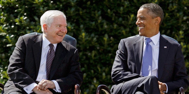 ARLINGTON, VA - JUNE 30: United States Secretary of Defense Robert Gates (L) and President Barack Obama share a laugh during Gates' Armed Forces Farewell Tribute on the River Parade Field at the Pentagon June 30, 2011 in Arlington, Virginia. Appointed by former President George W. Bush in 2006, Gates is credited with many landmark decisions and actions, including the turning around of the war in Iraq by directing the troop surge, the repeal of the don't ask, don't tell policy, the handling of the Walter Reed Army Medical Center neglect scandal and a huge shift toward fiscal restraint in military spending. Gates will be succeeded as head of the Pentagon by CIA Director Leon Panetta. (Photo by Chip Somodevilla/Getty Images)