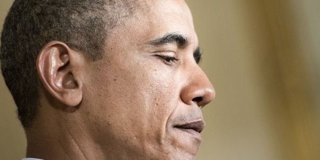 US President Barack Obama speaks about poverty during an event in the East Room of the White House's private dining room Janu