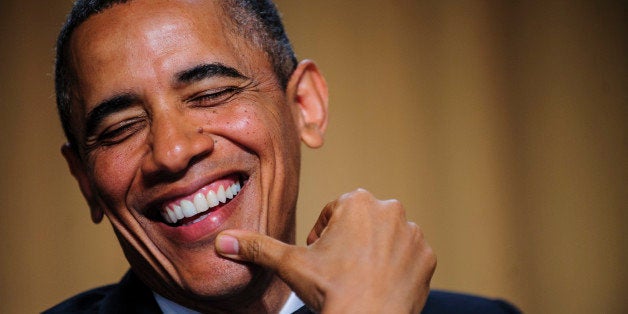 Bloomberg's Best Photos 2013: U.S. President Barack Obama smiles during the White House Correspondents' Association (WHCA) dinner in Washington, District of Columbia, U.S., on Saturday, April 27, 2013. The 99th annual dinner raises money for WHCA scholarships and honors the recipients of the organization's journalism awards. Photographer: Pete Marovich/Bloomberg via Getty Images