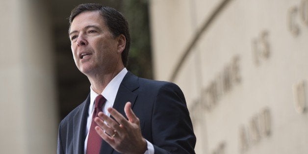 New FBI Director James Comey speaks during his installation ceremony at Federal Bureau of Investigation Headquarters in Washington on October 28, 2013. Comey replaces longtime FBI Director Robert Mueller, who recently retired after 12 years leading the organization. AFP PHOTO / Saul LOEB (Photo credit should read SAUL LOEB/AFP/Getty Images)