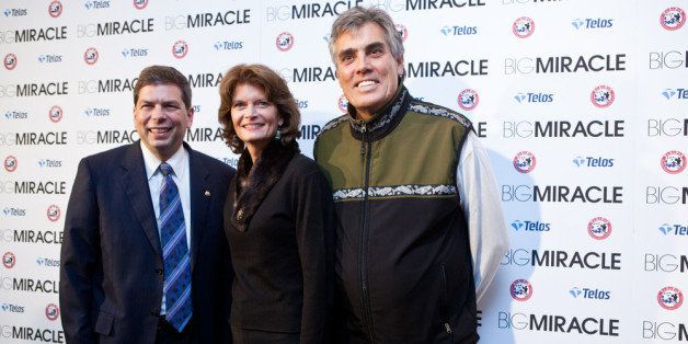 WASHINGTON - JANUARY 25: Sen. Mark Begich (D-AK), Sen. Lisa Murkowski (R-AK), and Murkowski's husband Verne Martell (L-R) pose for pictures at the Washington, DC screening of 'Big Miracle' on January 23, 2012 in Washington, DC. (Photo by Brendan Hoffman/Getty Images for Universal Pictures)