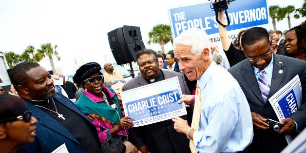 ST. PETERSBURG, FL - NOVEMBER 4: Former Florida Gov. Charlie Crist speaks with supporters after announcing that he will run for Governor as a Democrat on November 4, 2013 at Albert Whitted Park in St. Petersburg, Florida. Crist served as Florida's 44th governor as a Republican from 2007 to 2011. (Photo by Edward Linsmier/Getty Images)