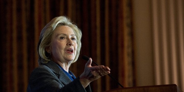 Former US Secretary of State Hillary Clinton speaks after receiving the 2013 Lantos Human Rights Prize during a ceremony on Capitol Hill in Washington on December 6, 2013. AFP PHOTO/Nicholas KAMM (Photo credit should read NICHOLAS KAMM/AFP/Getty Images)