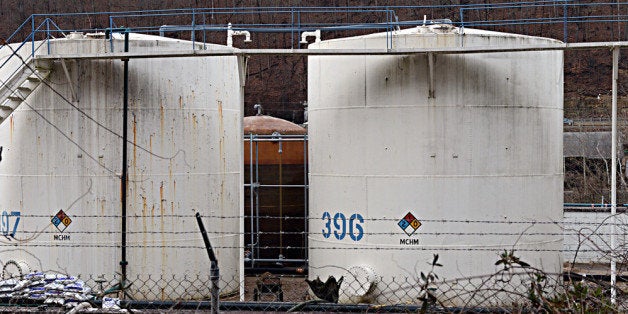 CHARLESTON, WV - JANUARY 10: Leaking MCHN tanks at Freedom Industries are being off loaded into tanker trucks on January 10,