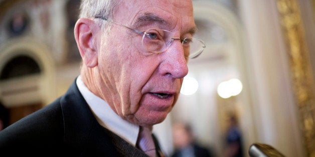 UNITED STATES - NOVEMBER 21: Sen. Charles Grassley, R-Iowa, talks with reporters in the Capitol after a vote in the Senate to end the minoritys ability to filibuster and kill most presidential nominations. (Photo By Tom Williams/CQ Roll Call)